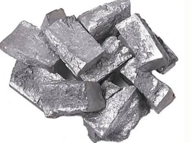 Pieces of metallic zinc on a white background
